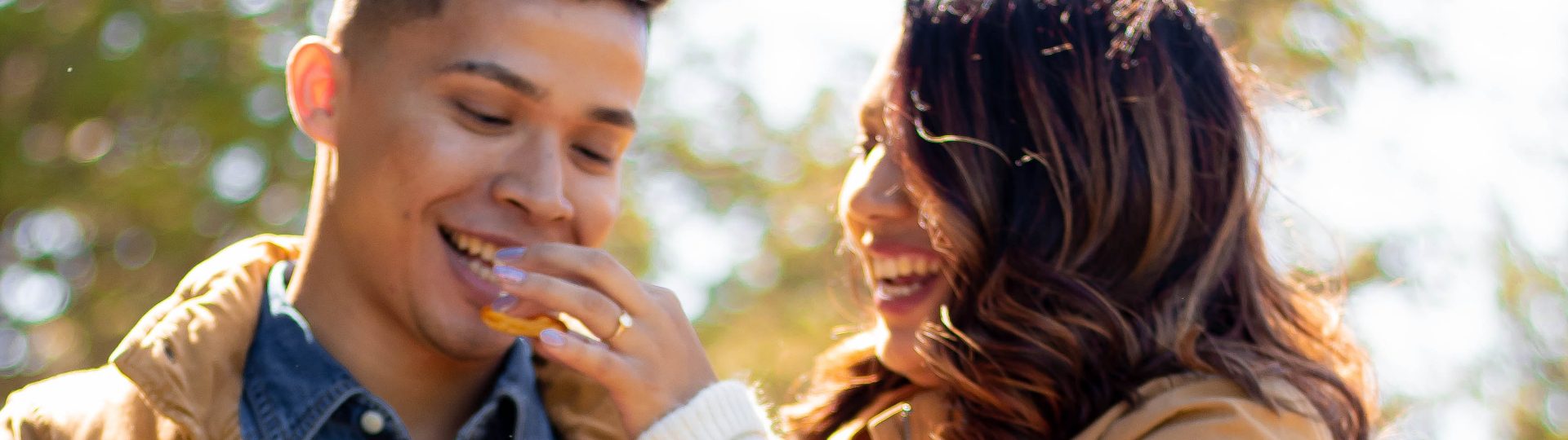 man and woman outside enjoying the day